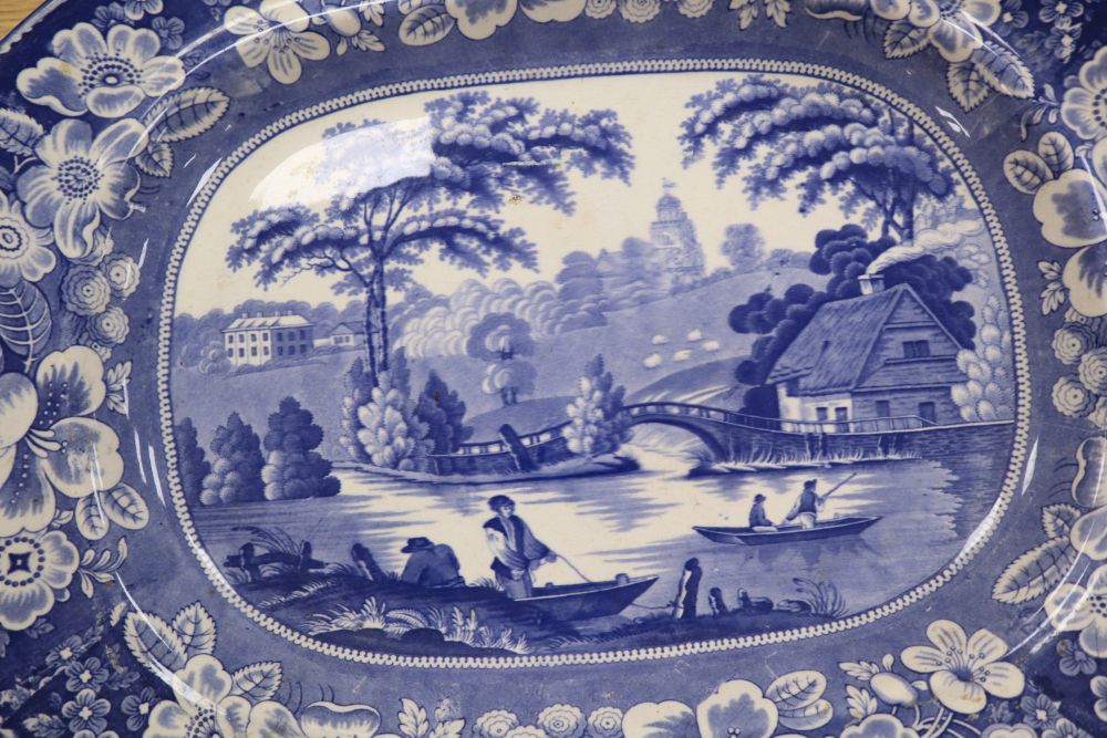 A collection of 19th / 20th century blue and white pottery including meat platters, dishes, bowls, etc.